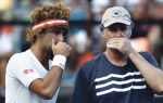 Nole i Vil Farel tokom  egzibicije u Kaliforniji