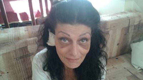 žena